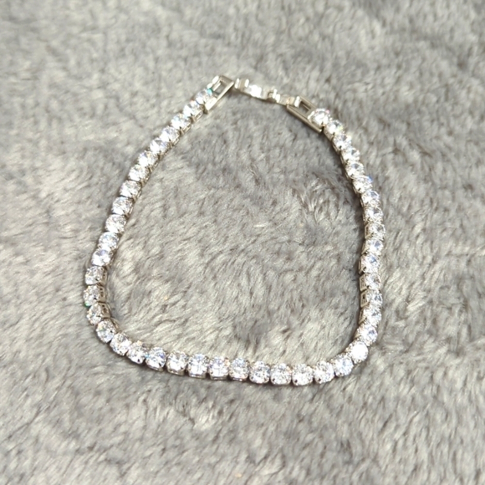 Classic CZ Tennis Bracelet set in Rhodium - 44 - 1/2 Carat Stones